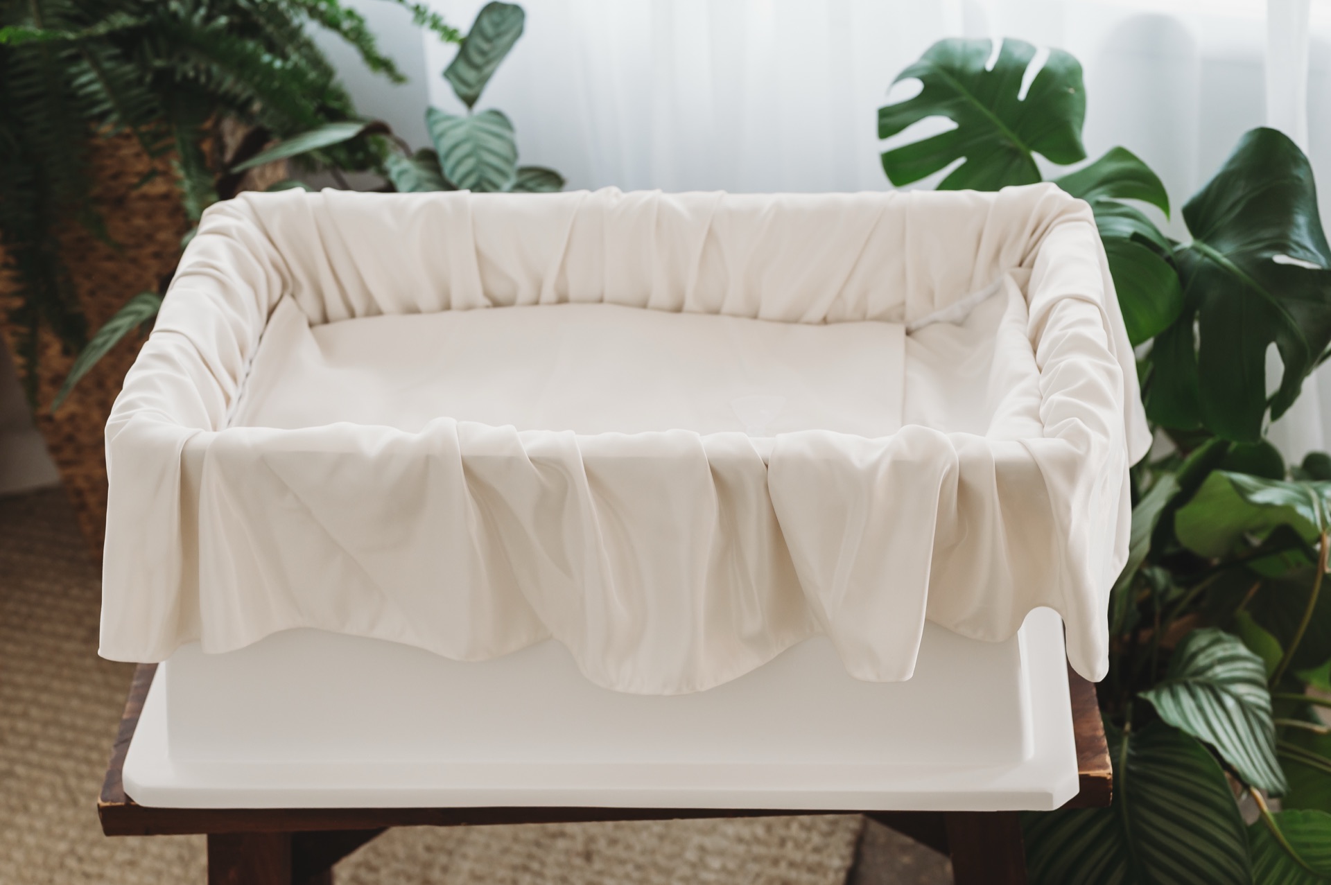 Baby casket with canopy and skirted base