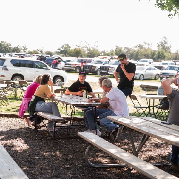 Group_picnic_outdoors_under_trees