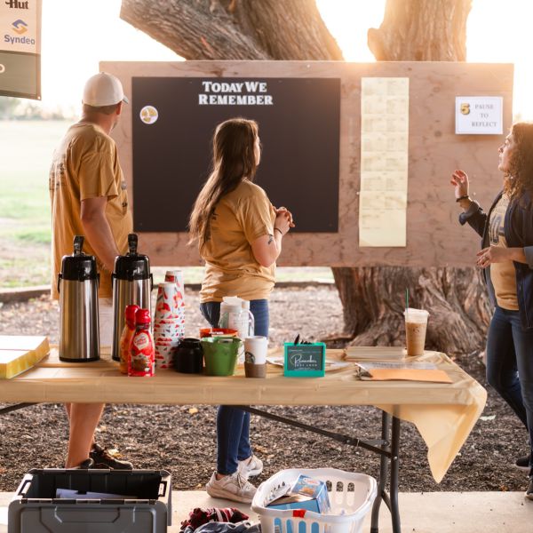 Group_working_together_at_an_outdoor_table