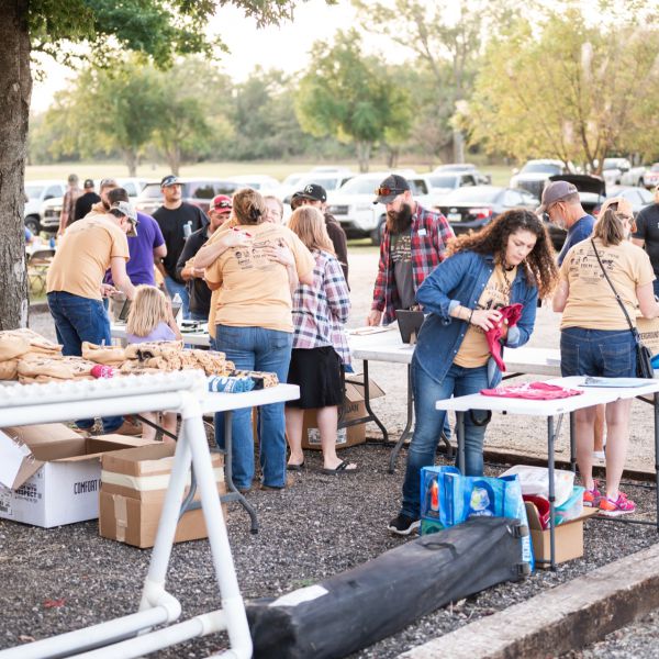 Large_group_of_people_preparing_for_sscdsg_outdoor_event