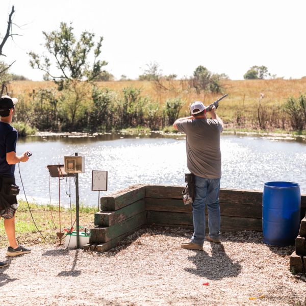 Man_shooting_clay_pigeons_at_outdoor_range