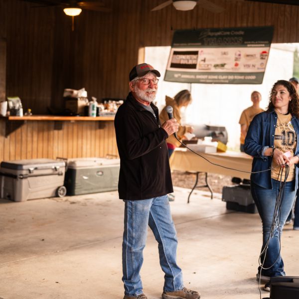 Man_speaking_at_podium