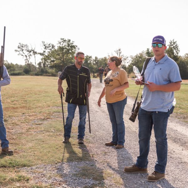 Men_with_clay_gathered_outside