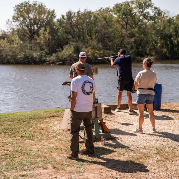 People_shooting_clay_at_lake