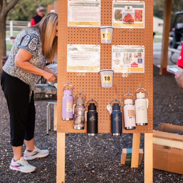 Woman_checking_information_display_raffle