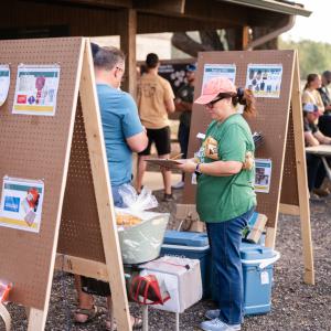 SSCDSG_workers_setting_up_raffle_board